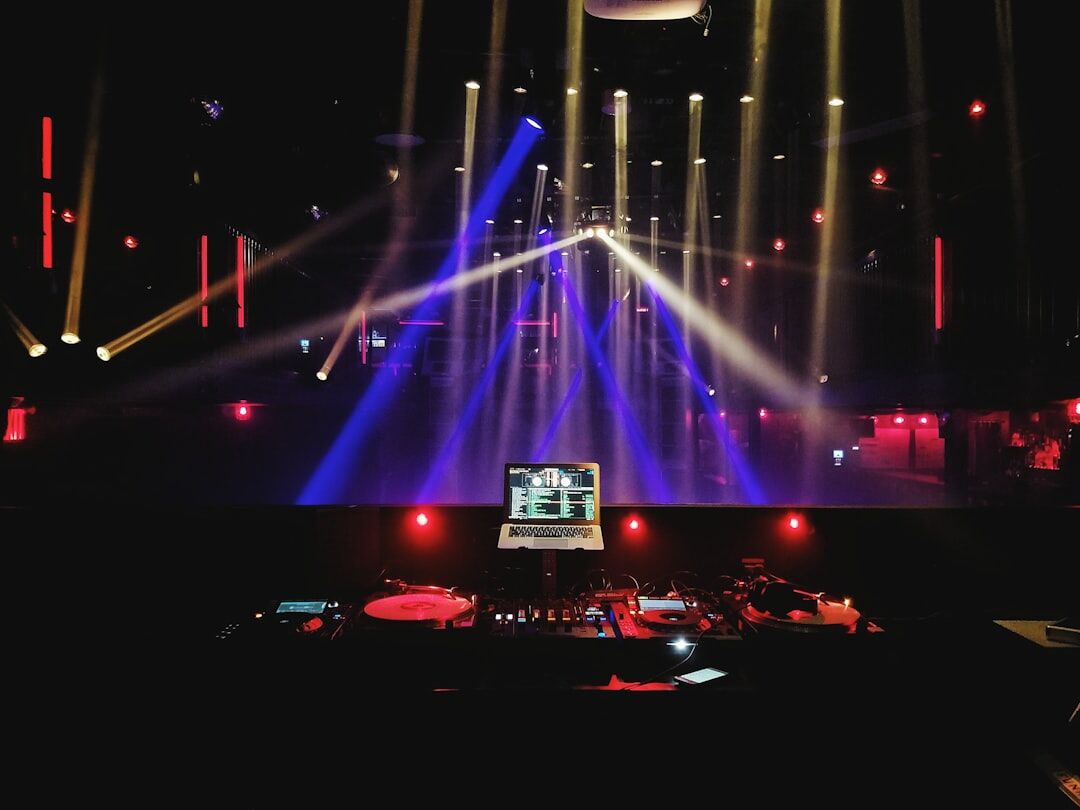 Live show stage with stage lighting and audience seating