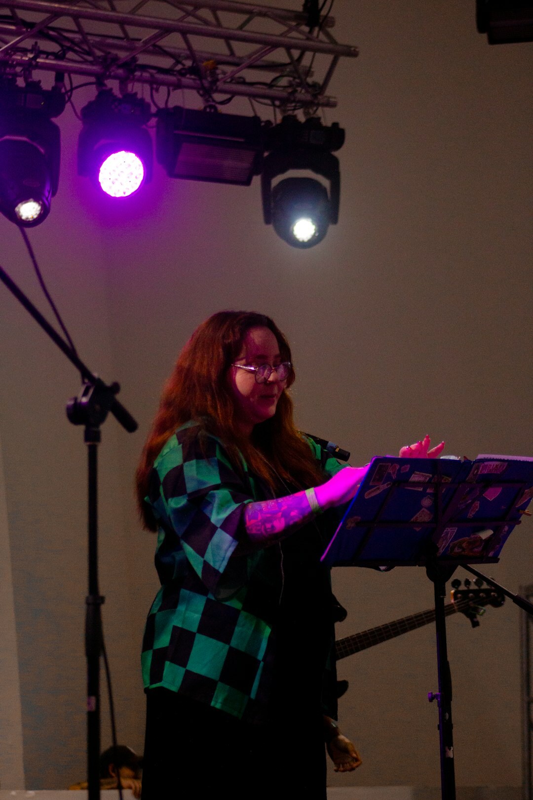 Portrait of a live show producer holding a clipboard